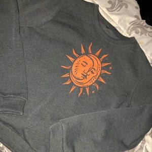 Sweatshirt with sun and moon decal bought as extra large but fits like a large